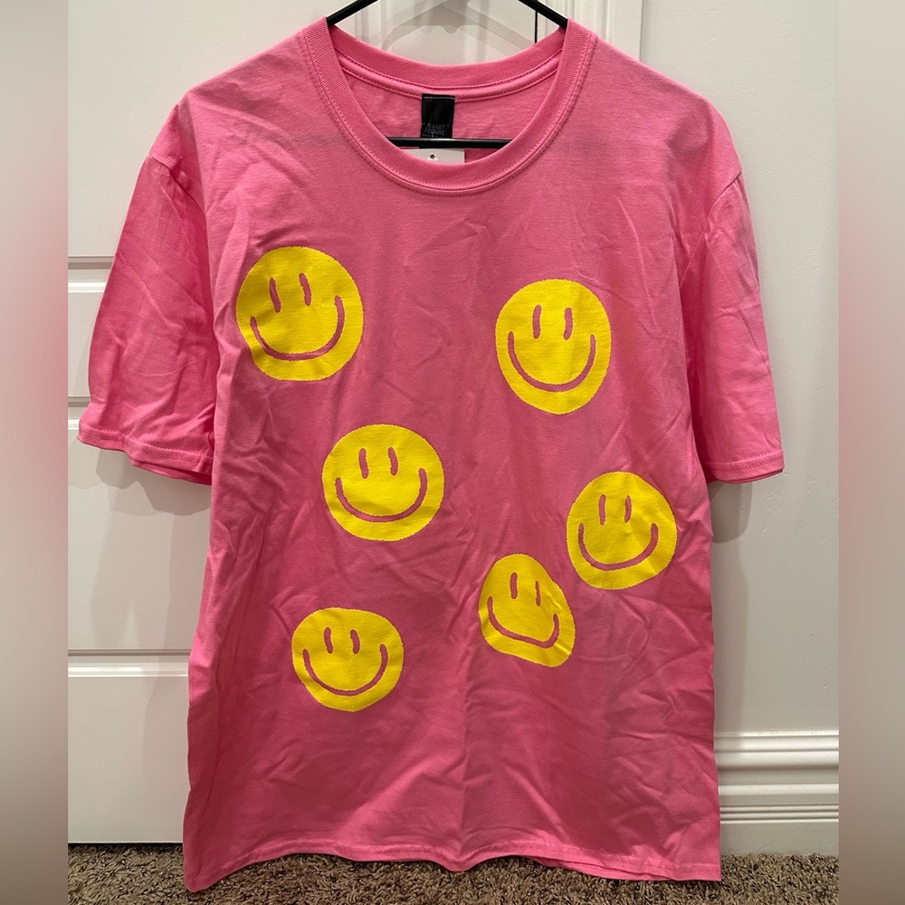 NWT! Women’s oversized graphic tee. Brand: Sweet Claire. Size: S/M.